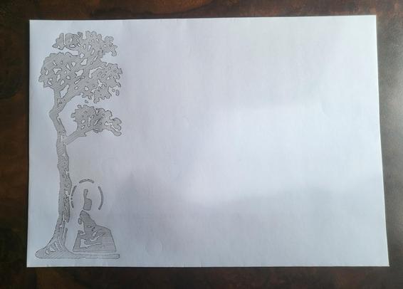 A C5 sized envelope with a stylized drawing of Buddha under a tree drawn with diagonal lines in black