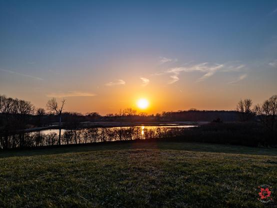 Landscape photo of the sky in a open grassy plain