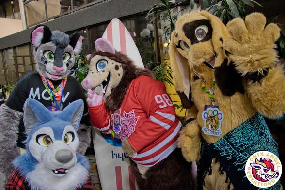 A group of fursuiters posing for a photo