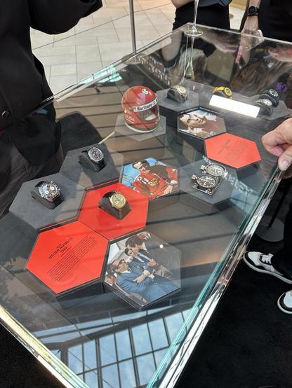 Some iconic Tag Heuer wrist watches and stop watches related to racing.