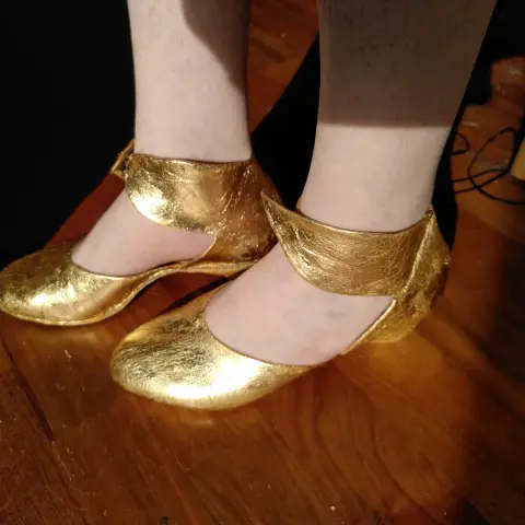 its me wearing shoes I made.
they're elegant and golden