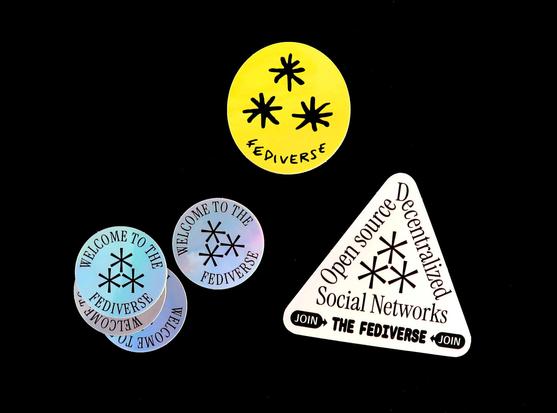 A bunch of fediverse stickers showing the ⁂ (asterism) symbol.