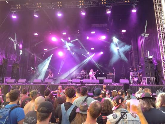Rock band rocking on the Eiger stage.