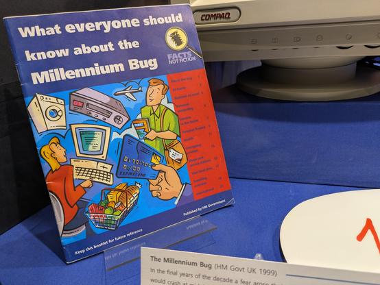 Museum exhibit of a booklet titled "What everyone should know about the Millennium Bug".
