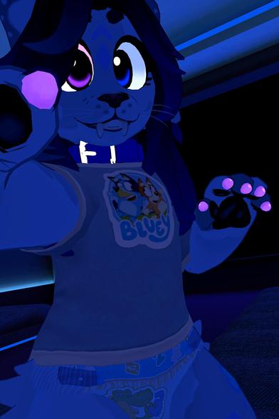 The photo shows a furry character, possibly a digital rendering or from a video game, wearing a diaper and a shirt with a "Bluey" logo. The character is giving a thumbs up with one hand and showing its paws with the other. The lighting is dark blue.