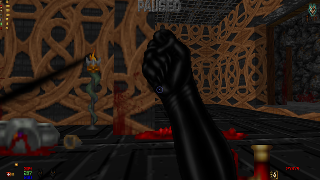Another screenshot of Heretic running with Guncaster. The player is doing an uppercut punch, again showing off the fact that he seems to be wearing a latex catsuit.