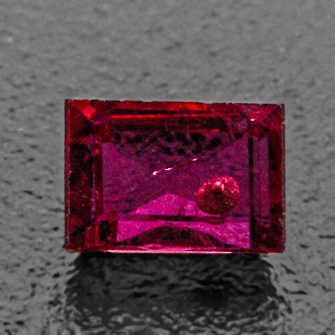 Burma ruby with molten crystal inclusion