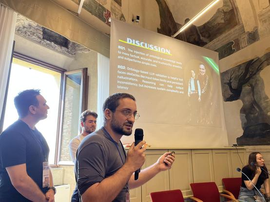 Team Jedi presenting their research output on LLM-supported ontology evaluation with an engaging presentation inspired by STarWars.
