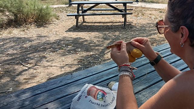 Person crocheting in public