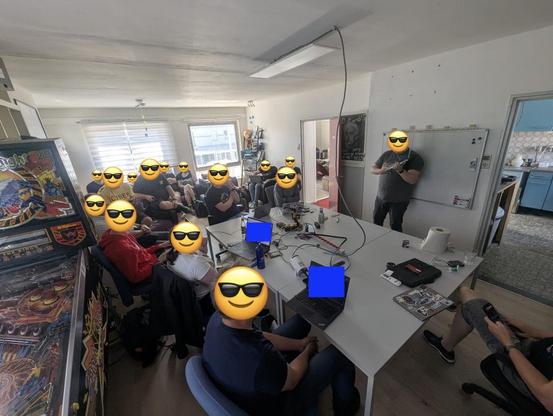 The Hack42 workshop room with cool emoji people enjoying the workshop