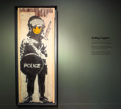 Smiling Coppers, by Banksy