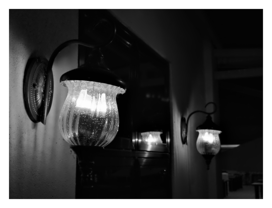 Two vintage-style wall sconces.