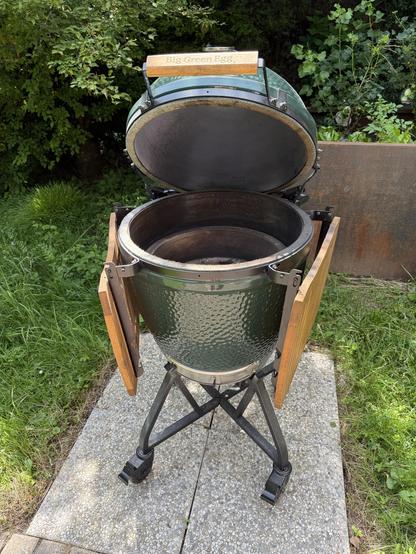 A total view of the Big Green Egg opened up.
