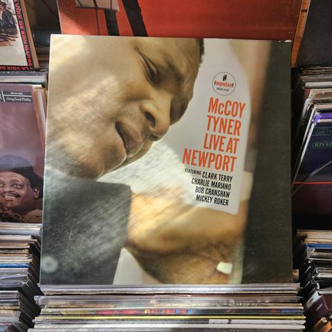 Album cover features a close-up color photograph of MT playing the piano. He's squinting, and has a look of contemplation on his face.