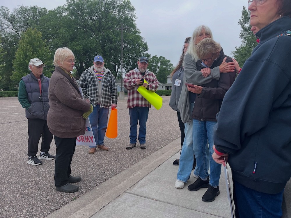 Protesters in Morris, MN hearing the news of the death of one of our Democratic legislators