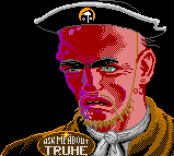 Screenshot von Cobb aus der Atari ST-Version von "The Secret of Monkey Island". Allerdings wurde seine Kleidung orange eingefärbt, es befindet sich das Computertruhe-Logo auf seinem Hut und auf seinem Anstecker steht "Ask me about Truhe".