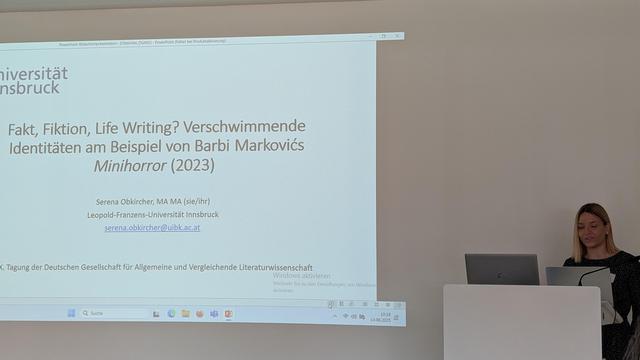 Serena Obkircher in front of her presentation