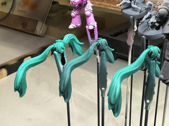 The three Miku heads for the three bodies.