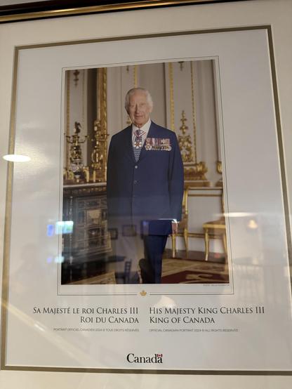 A picture of King Charles on the wall at the Royal Canadian Legion.