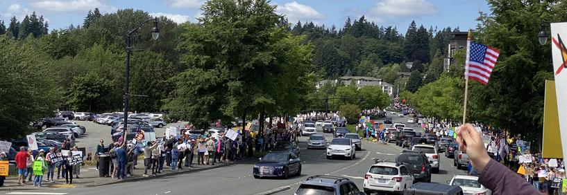 another photo of crowds in Bothell, also incomplete, showing large crowds on both sides of Woodinville Drive. Like the last photo, this one is not in any way complete. the crowds ran from past the east bridge over SR522 to west on Bothell Way around Brooks Automobile, and also up over a block into downtown along Bothell-Everett Highway.