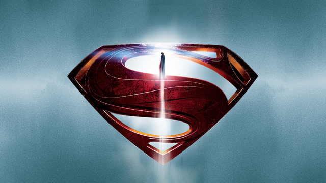 The Superman logo with Superman flying in front of it going straight up.