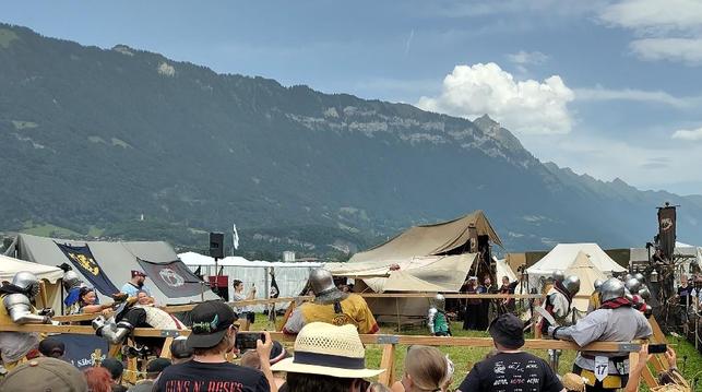 Knights fighting with improvised "sports gear" like pans, paddles and melons :D