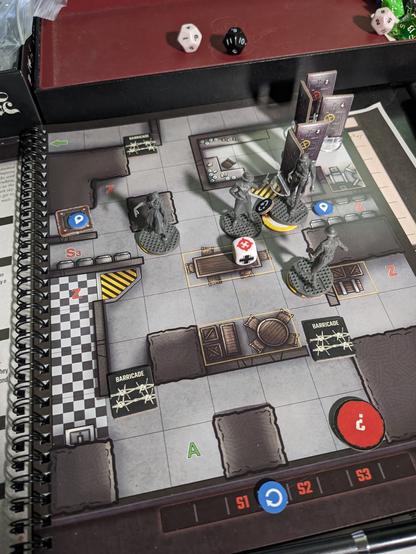 Dr. S has made her way over the spiral bound mission and map book. The zombies are in full chase. This is all represented with excellent minis on nicely printed maps in a sleek tactical solo game. There are nice touches like the d6 that is used for your characters action status, as well as some nice standees for the doors. There are also tiles and tokens which affect the terrain and depict the zombies before their threat is known, at which point the mini is used, to excellent effect.