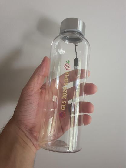 Refillable plastic water with branding “GLS [Gypsy Lore Society] 2024 Sofia”