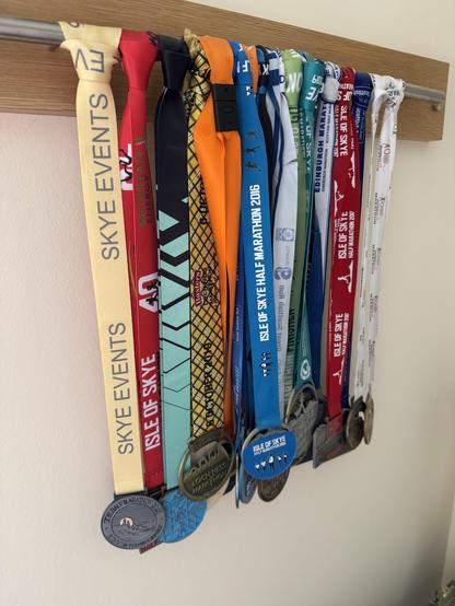 A display of my various half marathon and marathon medals I made.