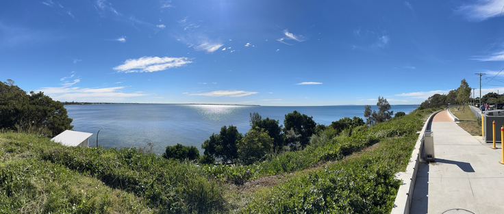 3 & 4 A wide shot of Moreton Bay with a bright pool of sunlight shimmering on the water’s horizon, highlighting where Redcliffe is.