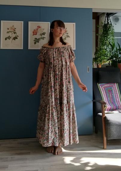 The same woman wearing only the dress.