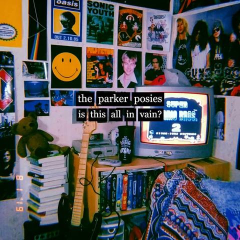 [pochette de single :] Une vue partielle d'une chambre, qu'on imagine celle d'un·e adolescent·e : posters de rockstars partout sur les murs, une pile de livres avec un ours en peluche au sommet, une télé vintage reliée à une vieille Nintendo posée sur une étagère basse remplie de cassettes VHS. Une guitare électrique est posée contre cette étagère. Dans le coin inférieur droit du cliché, un morceau de tissu aux motifs bariolés de bleu et de rouge essentiellement suggère la présence d'un lit ou du moins d'un canapé ou d'un fauteuil hors champ. En plein centre de la photo, en caractères blancs surlignés en noir, nom du groupe (The Parker Posies) et celui du single (Is this all in vain ?).