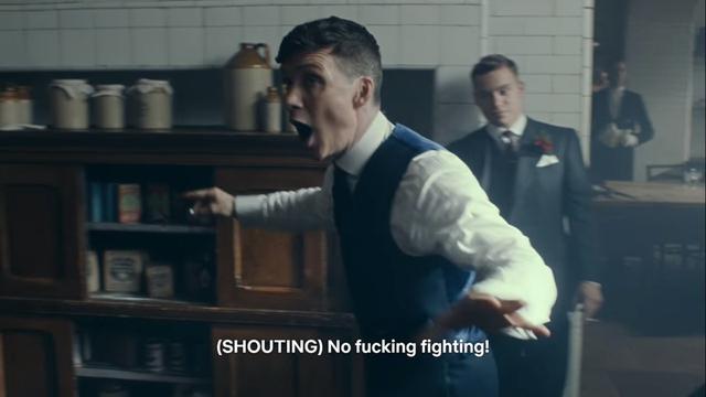 Tommy shelby from the peaky blinders famous scene, screaming "no fucking fighting!"