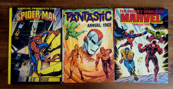 Three 60's & 70's marvel comics annuals - Spiderman, Fantastic, and the Mighty World of Marvel. featuring spidey, early Iron Man, Hulk, Captain Marvel, Daredevil and MY MAN LUKE CAGE