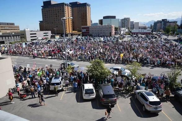 Photo of downtown Anchorage, beautiful day. Protest if around 5,000