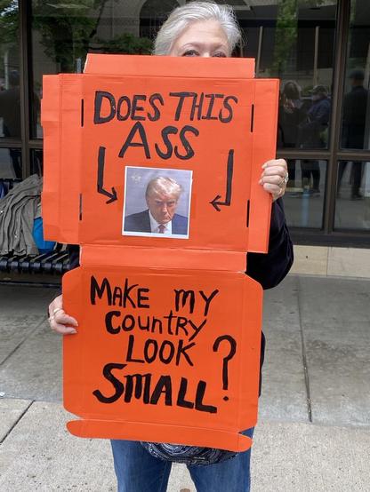 Pizza box painted orange. I DOES THIS ASS make my country look SMALL?