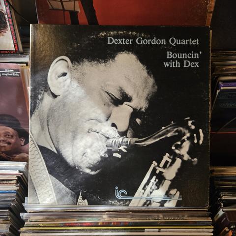 Album cover features a b&w photograph of DG playing the sax.