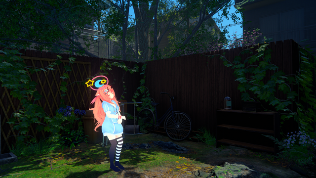 A view of a garden with a wooden fence on a sunny day. An avatar is enjoying the sunshine.