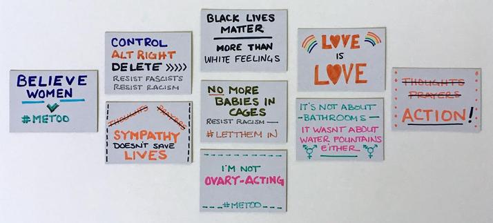 Additional tiny protest signs for the pussy-hatted Funko Pop in the first image, including

Control Alt Right Delete/Resist Fascists/Resist Racism
Black Lives Matter more than white feelings
Love is Love
Thoughts Prayers (both crossed out) Action
It's not about bathrooms/It wasn't about water fountains either
I'm not ovary-acting
Sympathy doesn't save lives