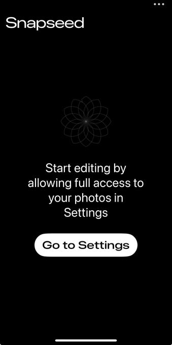 A black screen displaying the Snapseed logo at the top with a message instructing users to allow full access to their photos for editing purposes. A button labeled "Go to Settings" is prominently featured at the bottom.