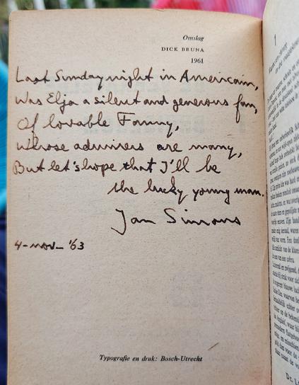 An open paperback book showing a handwritten inscription in ink on the inside of the cover:

Last Sunday night in Americain, 
Was Elja a silent and generous fan,
Of lovable Fanny, 
Whose admirers are many, 
But let's hope that I'll be the lucky young man.

Jan Simons

4-nov-'63