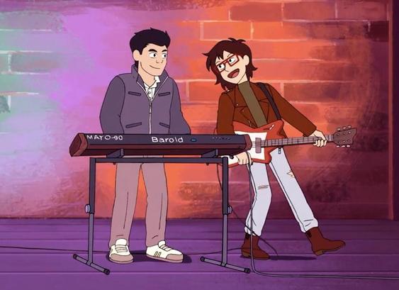 Screenshot from episode 10, The Train to Nowhere. On stage at the open mic in Utica, Min-Gi stands behind his keyboard while Ryan leans backwards towards him, playing his guitar.