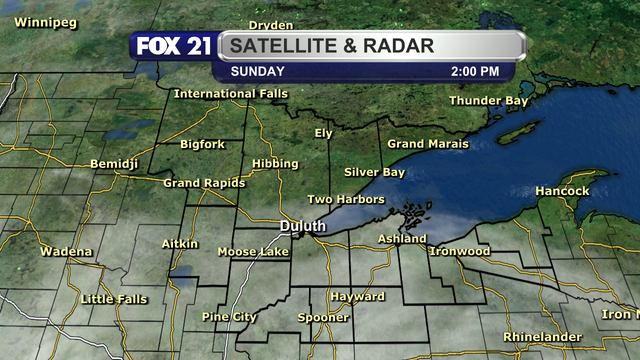 The satellite and radar over the Northland at 2 p.m. on Sunday, June 15, 2025, shows cloudy skies along and south of Highway 2, with clear skies north of the highway.  No precipitation is being detected.
