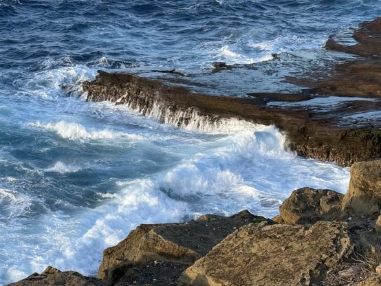 Rocky coastline after a wave came in