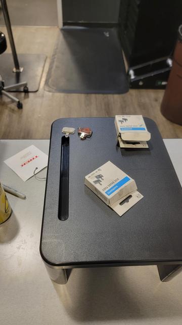 May be a a black pen on a black table