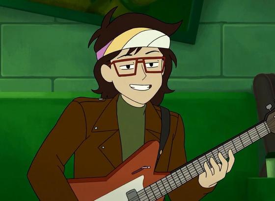 Cropped screenshot from episode 6, The Party Car. Ryan is looking up from his guitar with a sly grin on his face.