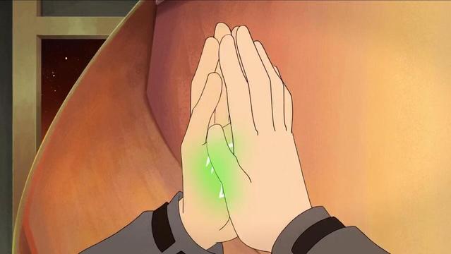 Screenshot from episode 5, The Astro Queue Car. close up of Min-Gi and Ryan's numbered hands in a loose high-five.