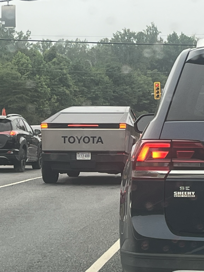 A Tesla CyberTruck with ‘TOYOTA’ in big letters on the rear