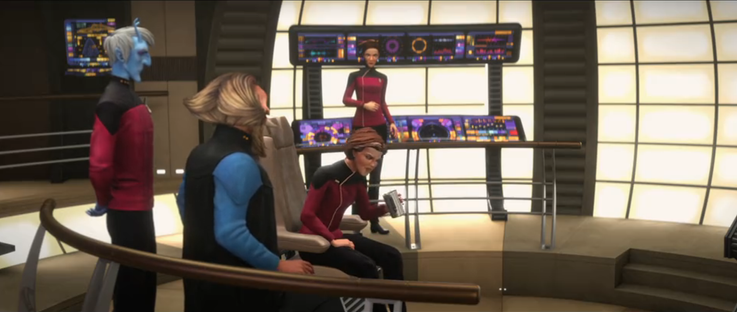 A shot of Admiral Janeway (as Dal) sitting in the Dauntless Captain's chair looking in disgust at a cup of coffee that she just took a sip of.  Tysess, Noum and Asencia are also on the bridge.  From E118