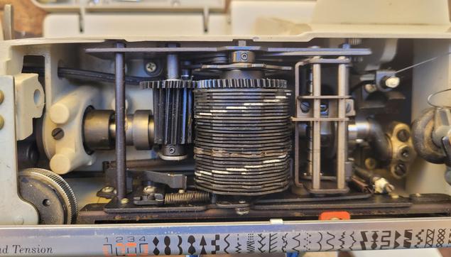 Gears and cams for zig zagging